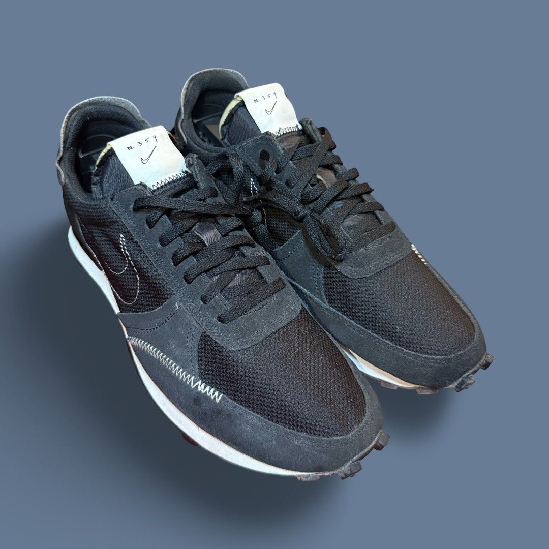 Nike Daybreak Type Black N.354 (Category: Casual Shoes) located in Del Monte. Submitted by jasonjuan31 (Listing ID 1466498061, Image 2). Description: - Brand: Nike - Model: Daybreak Type - Color: Black with white midsole - Material: Mesh and suede upper with exposed stitching - Sole: Waffle rubber outsole (minor wear on soles) - Details: N.354 branded tongue tag and heel text, low-top running silhouette - Inclusions: Black laces included - Condit