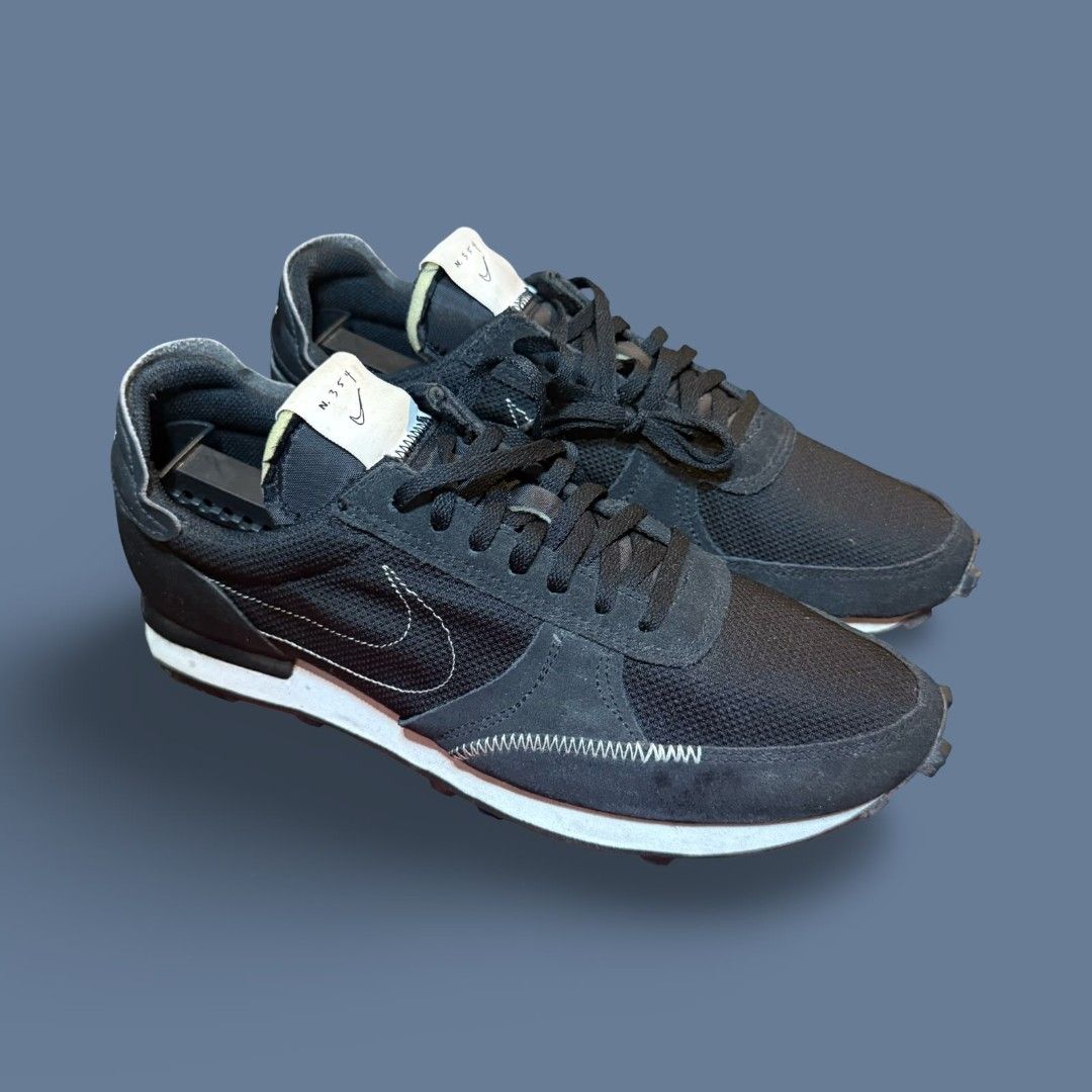 Nike Daybreak Type Black N.354 (Category: Casual Shoes) located in Del Monte. Submitted by jasonjuan31 (Listing ID 1466498061, Image 1). Description: - Brand: Nike - Model: Daybreak Type - Color: Black with white midsole - Material: Mesh and suede upper with exposed stitching - Sole: Waffle rubber outsole (minor wear on soles) - Details: N.354 branded tongue tag and heel text, low-top running silhouette - Inclusions: Black laces included - Condit