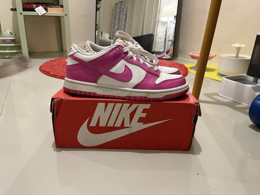 Nike Dunk Low Laser Fuchsia GS Size 5Y (Category: Sneakers) located in Cebu City. Submitted by nikchuuuu (Listing ID 1466539719, Image 3). Description: - Model: Nike Dunk Low - Colorway: Laser Fuchsia / White - Size: Youth 5Y (US Youth) 23.5cm - Condition: Clean, ready to wear, minor toe box creasing and slight midsole wear - Includes: Original red Nike shoebox - Features: Vibrant pink overlays, crisp white leather base, and matching pink rubber 