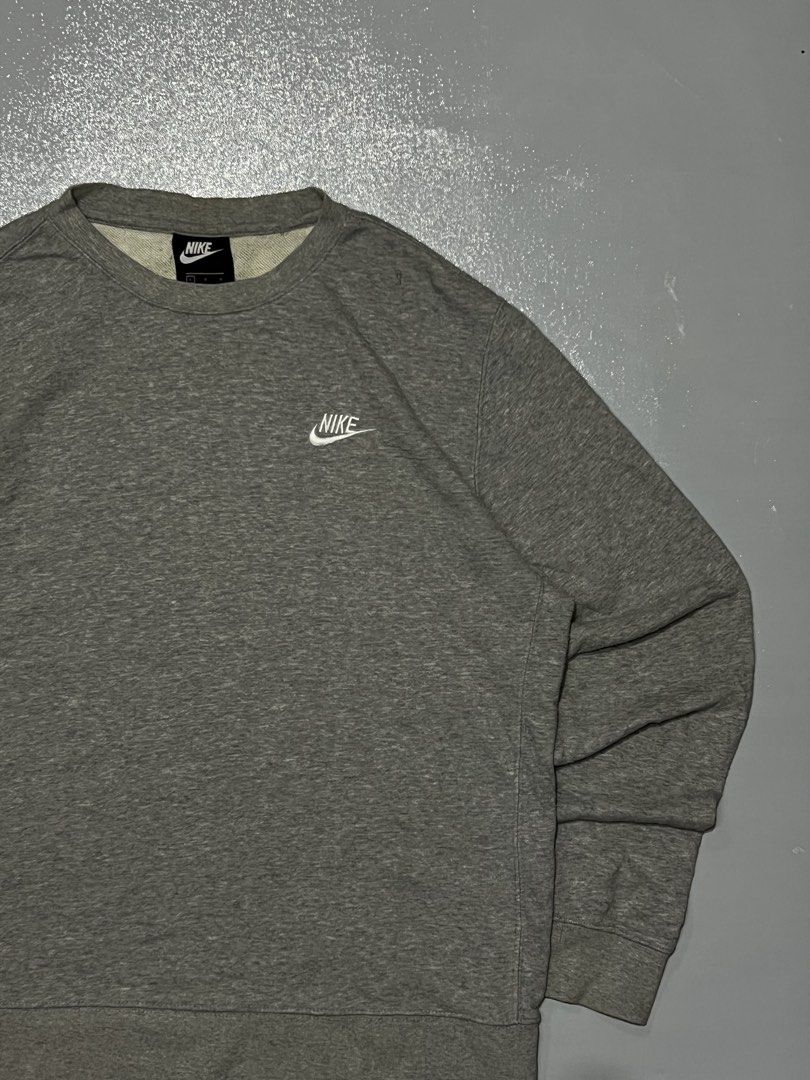 Nike Grey Sweatshirt Crewneck Size L (Category: Coats, Jackets and Outerwear) located in Manila. Submitted by ben_101202 (Listing ID 1466476849, Image 2). Description: Nike side logo Large on tag Dimes:24x28 Excellent condition .