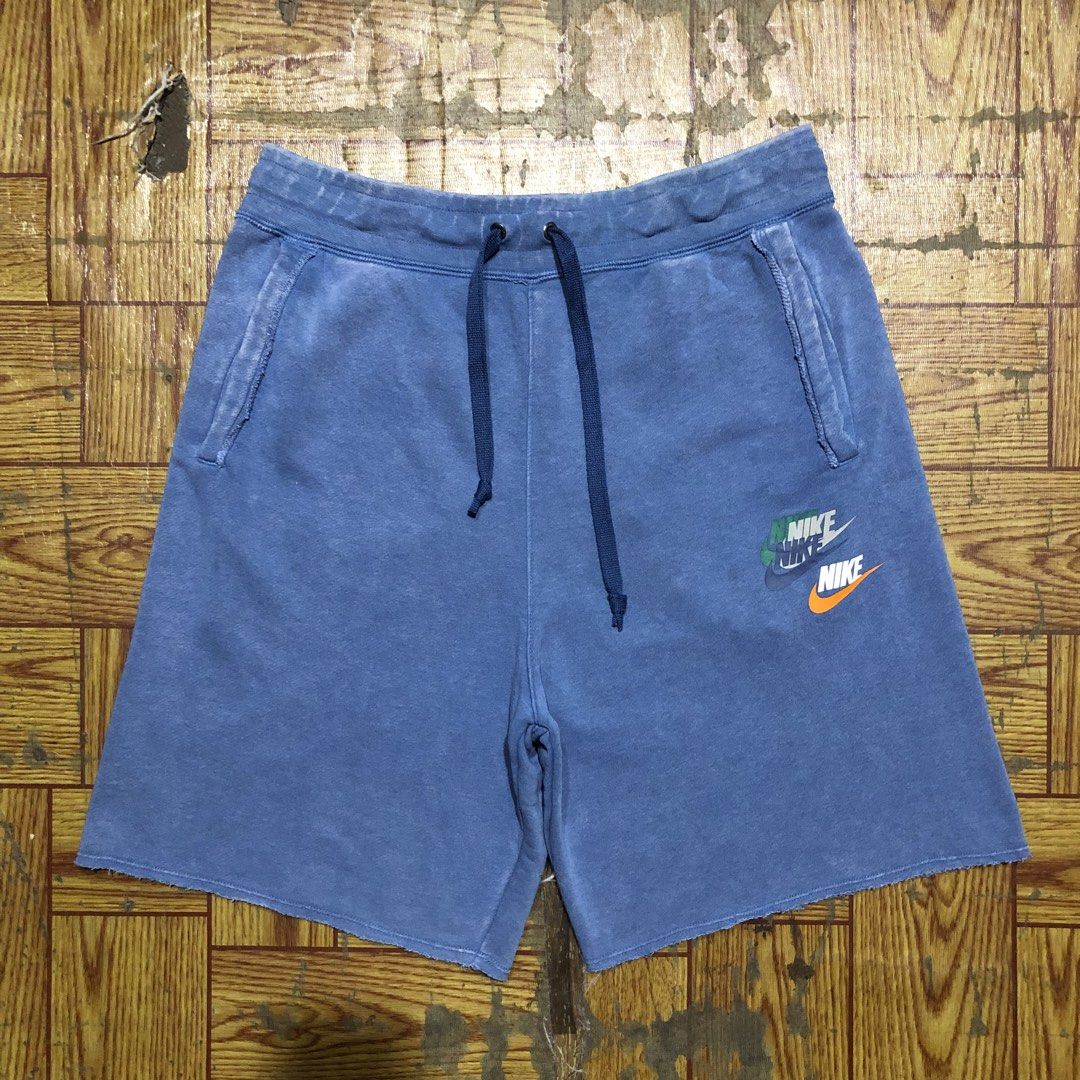 NIKE MULTICOLOR LOGO WASHED BLUE ALUMNI STYLE SHORT (Category: Shorts) located in Dasmarinas. Submitted by corenyxmessy_3rd_account (Listing ID 1466530930, Image 2). Description: waist - 31 to 36 length - 20.5.