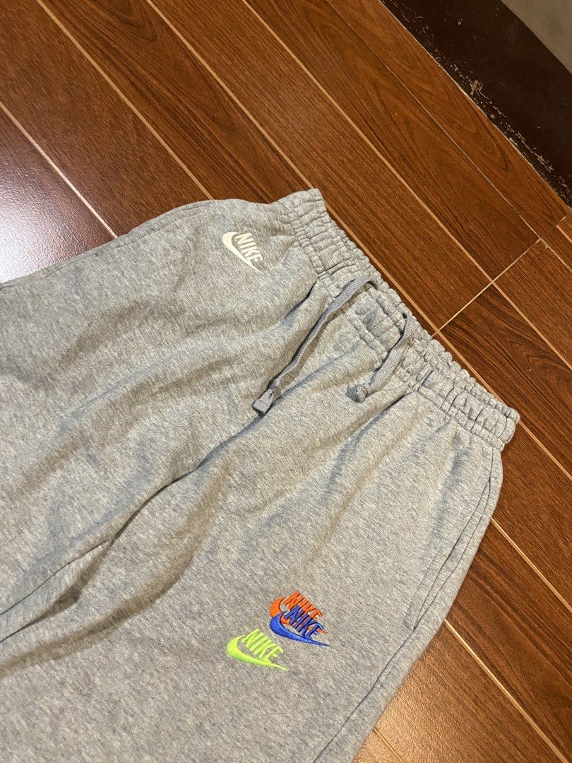 Nike Multi-Logo Grey Sweatpants (Category: Joggers) located in Mati. Submitted by frederickg48365 (Listing ID 1466412285, Image 2). Description: NIKE MULTI LOGO PANTS SIZE: SMALL DIMES: 30-36W x 36L EXCELLENT CONDITION NO ISSUE COLOR RATE 10/10 NEED WASH CLAIM📩 - Brand: Nike - Item: Grey Sweatpants with scattered embroidered logos - Size: Small - Condition: Clean fabric with crisp embroidery - Features: Elastic waistband with adjustable drawstri