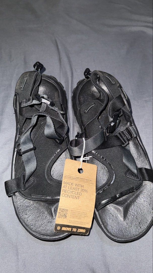 Nike Oneonta Black Sandals (Category: Slippers & Slides) located in Andop. Submitted by nobleangel (Listing ID 1466503675, Image 1). Description: - Brand: Nike - Color: Black - Condition: Brand new with recycled content tag attached - Features: Adjustable straps, secure heel toggle lock, comfortable footbed, and rugged outsole for outdoor grip - Best for: Everyday walking, hiking, and outdoor adventures Size 9-10 mens .