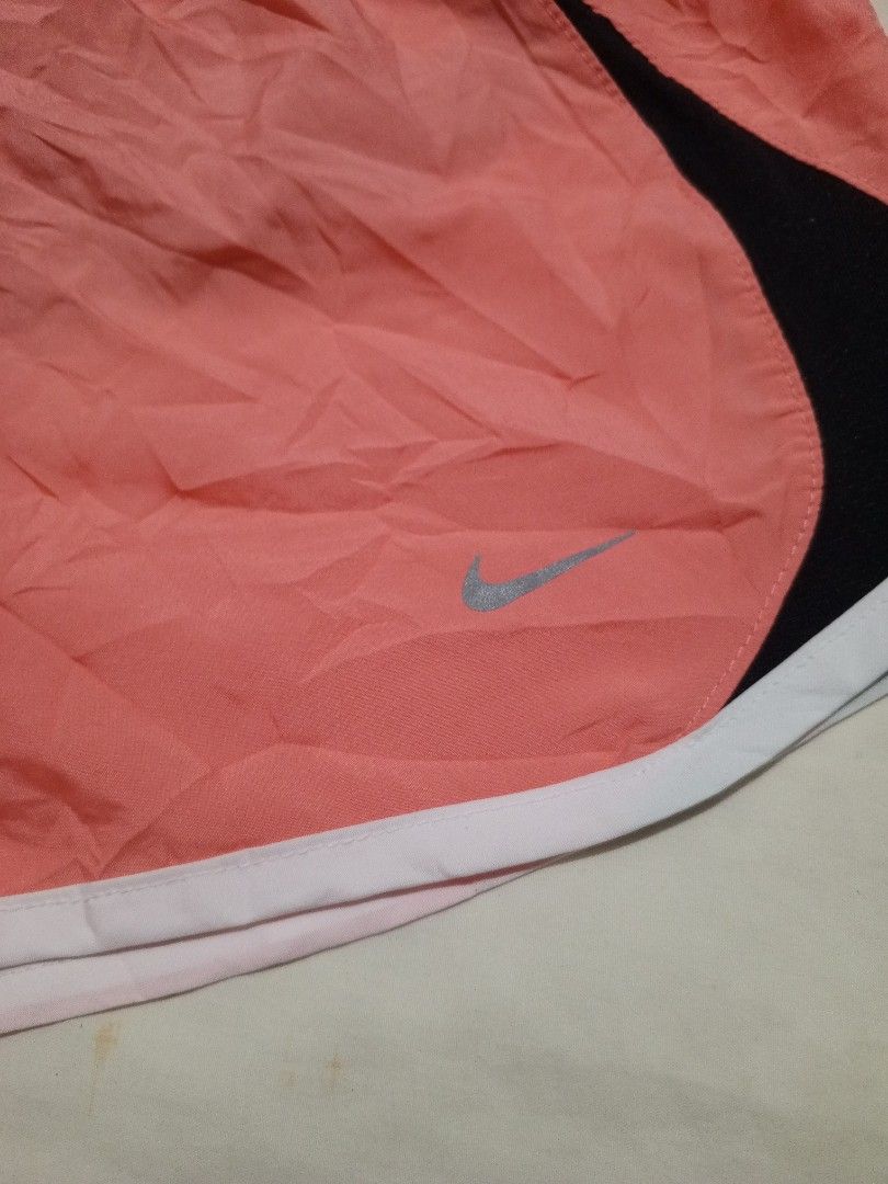 Nike peach Dri-fit shorts (Category: Activewear) located in Santa Maria. Submitted by paulo-garcia21 (Listing ID 1466458010, Image 2). Description: small on tag waist 25 to 31 length 9.5 hem 11.5 no flaws excellent condition.