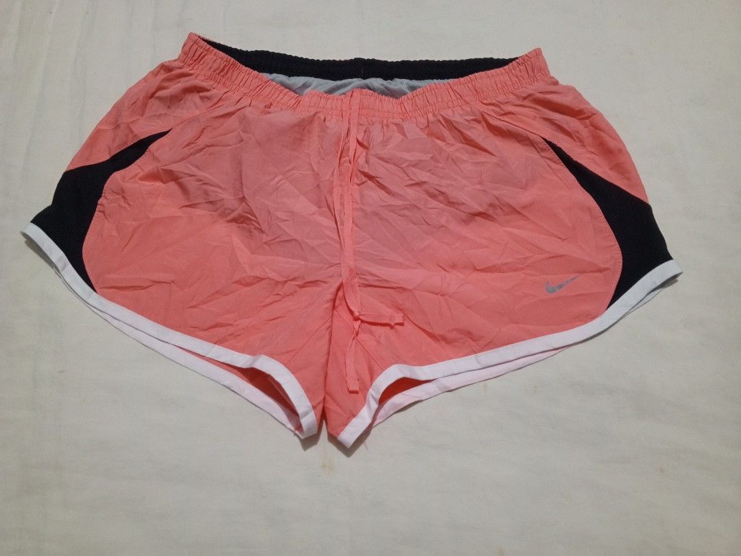 Nike peach Dri-fit shorts (Category: Activewear) located in Santa Maria. Submitted by paulo-garcia21 (Listing ID 1466458010, Image 1). Description: small on tag waist 25 to 31 length 9.5 hem 11.5 no flaws excellent condition.