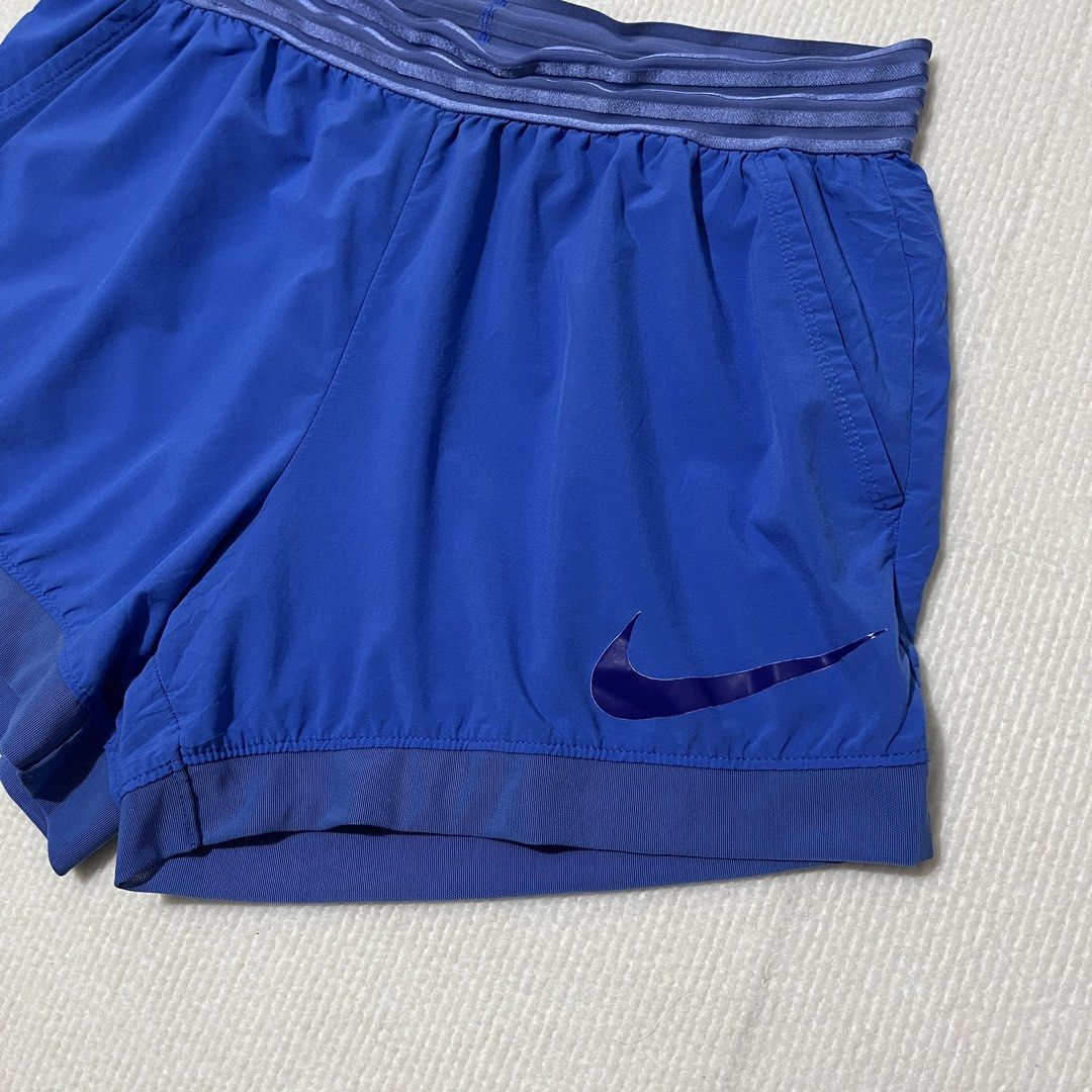 nike running short (Category: Activewear) located in Malay. Submitted by oplt_dept. (Listing ID 1466457925, Image 2). Description: -washed & clean(ready to wear) -running essentials -waist:30-36 stretchable -length:13 -leg opening:12 -exellent condition -made in Vietnam .