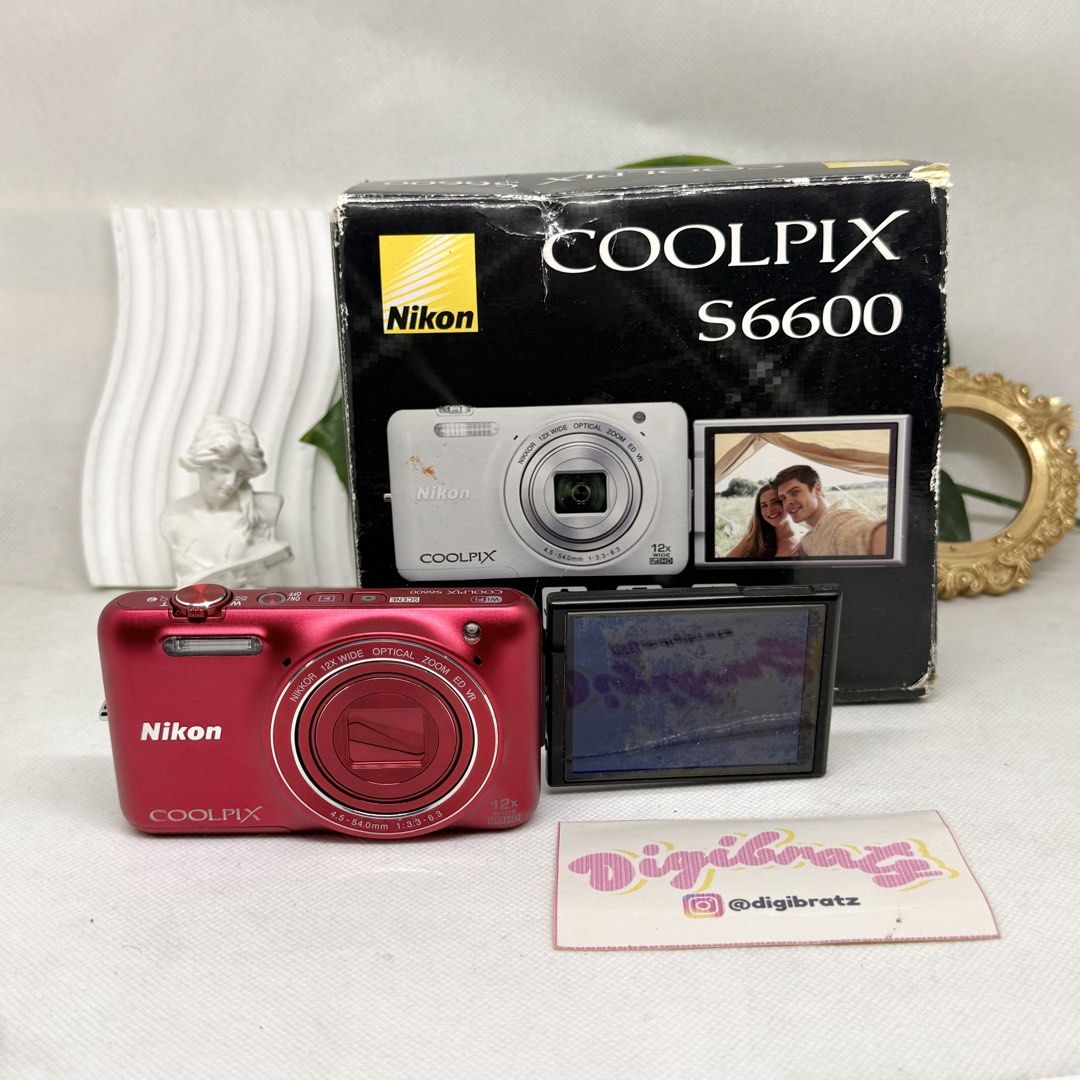 Nikon Coolpix S6600 Flip Camera Digicam (Category: Cameras) located in Cavite. Submitted by digi.bratz (Listing ID 1466393440, Image 3). Description: Nikon Coolpix S6600 BOXED UNIT ⤷ 🏷️Php18,999.00 ONLY 💌 @𝒅𝒊𝒈𝒊𝒃𝒓𝒂𝒕𝒛 on ig, tiktok, and carousell! ―୨୧⋆ ˚ 𝙃𝙄𝙂𝙃𝙇𝙄𝙂𝙃𝙏𝙎 - 16.0MP - BSI-CMOS sensor - 12x optical zoom (25–300mm equivalent) 🔭 - Built-in flash ✨ - 2.7” vari-angle flip LCD — perfect for selfies ♡ - Full HD 1080p video re