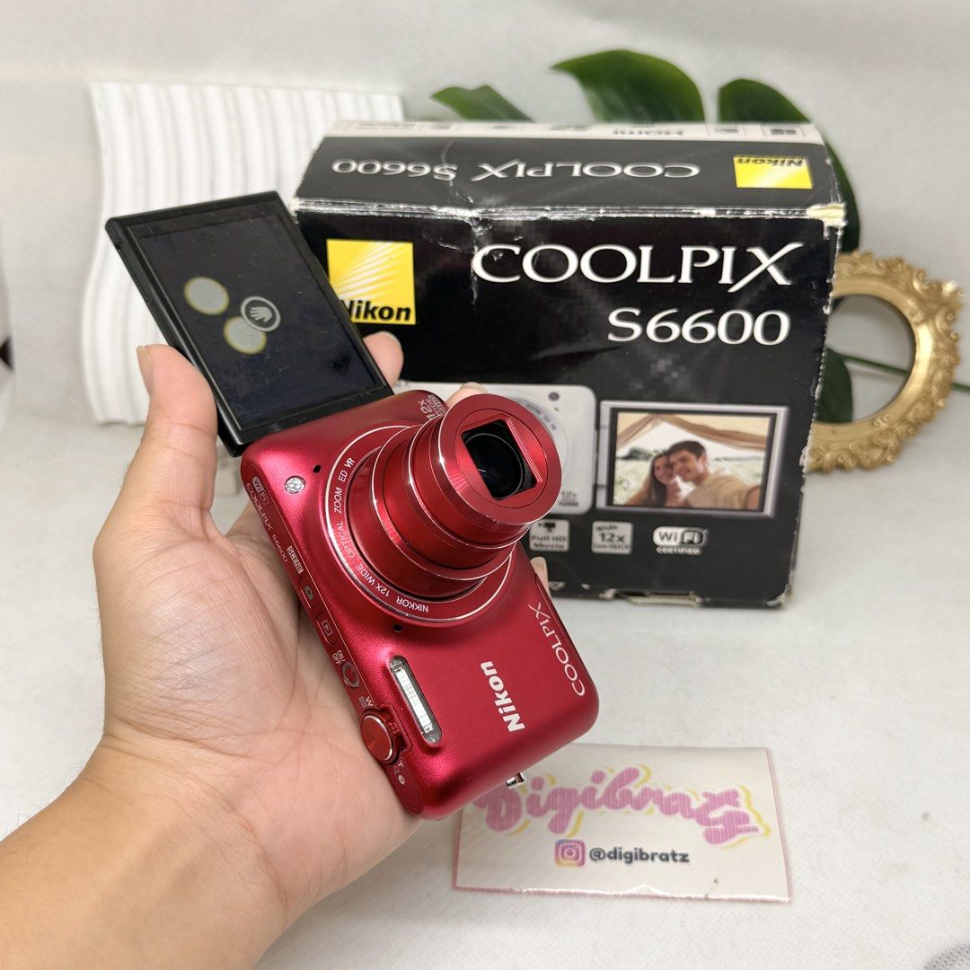 Nikon Coolpix S6600 Flip Camera Digicam (Category: Cameras) located in Cavite. Submitted by digi.bratz (Listing ID 1466393440, Image 1). Description: Nikon Coolpix S6600 BOXED UNIT ⤷ 🏷️Php18,999.00 ONLY 💌 @𝒅𝒊𝒈𝒊𝒃𝒓𝒂𝒕𝒛 on ig, tiktok, and carousell! ―୨୧⋆ ˚ 𝙃𝙄𝙂𝙃𝙇𝙄𝙂𝙃𝙏𝙎 - 16.0MP - BSI-CMOS sensor - 12x optical zoom (25–300mm equivalent) 🔭 - Built-in flash ✨ - 2.7” vari-angle flip LCD — perfect for selfies ♡ - Full HD 1080p video re
