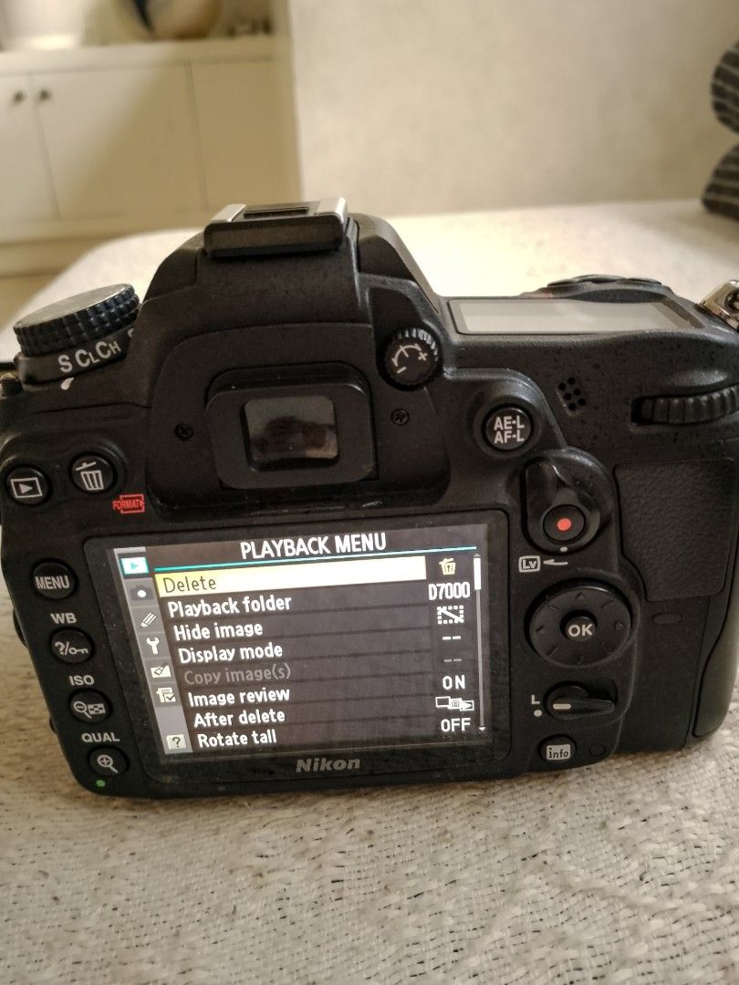 Nikon D7000 DSLR Camera with 18-55mm Lens (Category: Cameras) located in Caloocan City. Submitted by psalmerth.mountain (Listing ID 1466469539, Image 3). Description: - Nikon D7000 digital SLR camera body with AF-S DX Nikkor 18-55mm f/3.5-5.6G VR lens - Includes original neck strap and lens cap - Clean LCD screen and fully working menu functions - Intact rubber grips on body and zoom ring - Standard hot shoe mount and working built-in flash - Bat