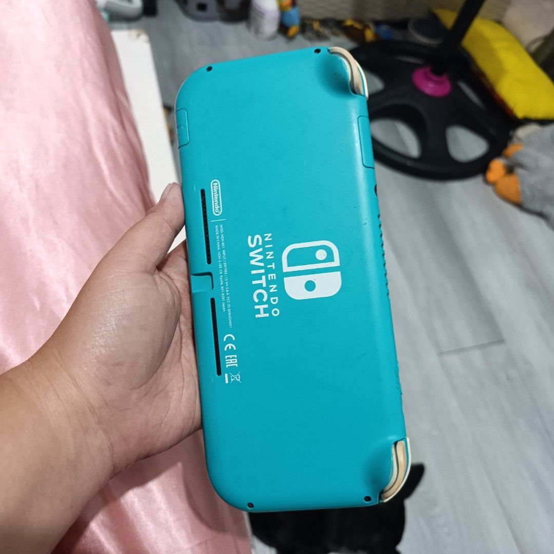 Nintendo Switch Lite Turquoise (Category: Nintendo) located in Manila. Submitted by cedieleen (Listing ID 1466493800, Image 2). Description: Unit only, non jailbreak no games, no sd card honest issue: hard press down button, signs of usage bawal sa maarte, nalalaro pa rin fix price 3,800 only.