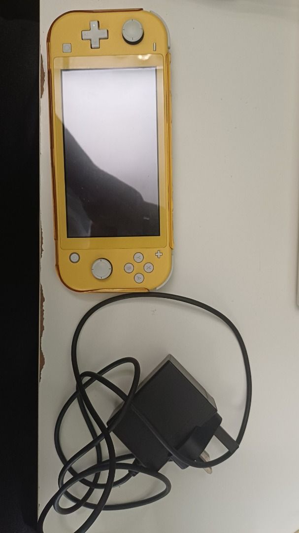 Nintendo Switch Lite Yellow (Category: Nintendo) located in Caloocan City. Submitted by pixel_bros (Listing ID 1464261002, Image 3). Description: FOR SALE @ Pixel Bros ㅤ NINTENDO SWITCH LITE Yellow Price: ₱4,900 fixed. INCLUDED: - Console w/ Tempered Glass - Original Box - Original Charger ㅤ CONDITION - Fully working and tested - Very slight LCD vignette shown in the photos, not noticeable while playing - No other issue, all buttons working and n