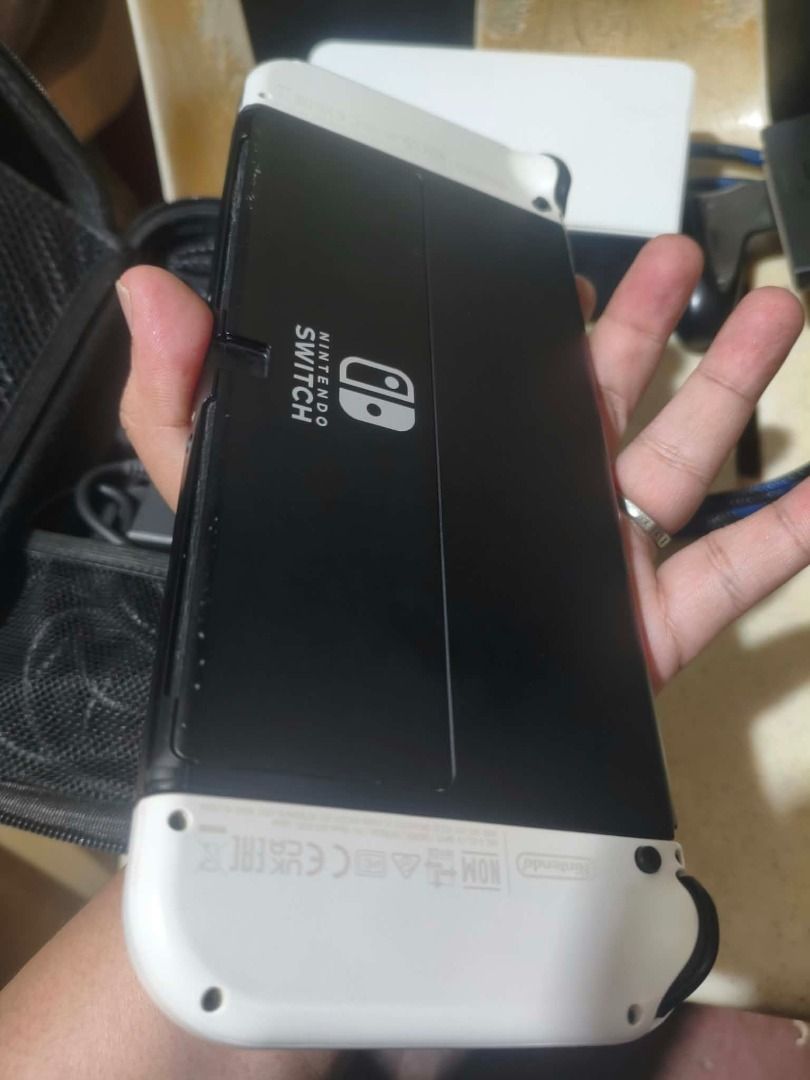 nintendo switch oled 256gb jb for sale (Category: Nintendo) located in Manila. Submitted by seiyatakehara (Listing ID 1466552937, Image 3). Description: for sale or swap sa ibang items plus cash nintendo switch oled jb 256gb full of games complete accesories pouch tempered glass installed wala lang box no issue condition: minor scratch since its 2nd hand for only 12999 pesos or swap sa ibang items plus cash swapping price is higher than selling p