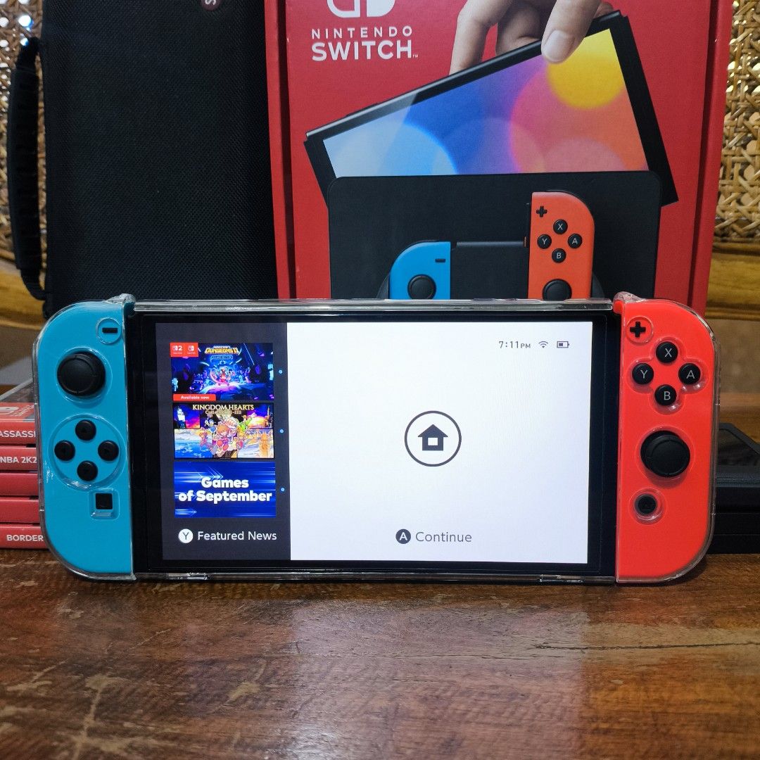 Nintendo Switch OLED with Games (Category: Nintendo) located in Manila. Submitted by kmswitchhubph (Listing ID 1466383813, Image 3). Description: FOR SALE • FOR SALE • FOR SALE ✨ NINTENDO SWITCH OLED GOOD AS NEW 📦 COMPLETE ACCESSORIES WITH BOX • Original Joycon grip • Original Joycon strap • Original Dock • Original HDMI • Original Charger 🎁 FREEBIES • Crystal Case • Skull & Co. Carrying Case • Switch Stand • Switch Games Case 🎮 5 PHYSICAL GAM