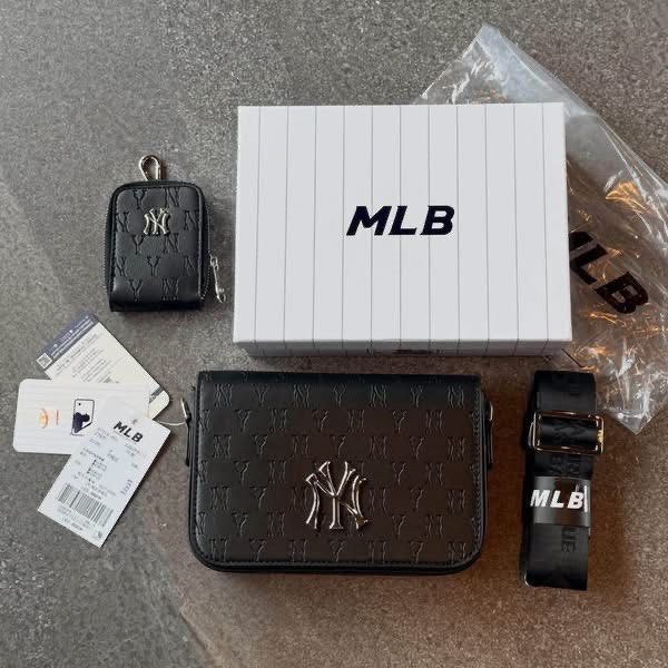 NY MLB Monogram Sling Bag (Category: Sling Bags) located in Manila. Submitted by hatline_co. (Listing ID 1466348157, Image 1). Description: NY MLB Mońoğram Sling bag Comes with Sling coin purse, MLB KOREA HARD BOX With hangtags Adjustable strap Inner pocket Inner 1zip SALE!!.