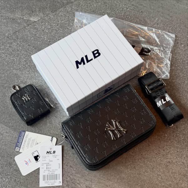 NY MLB Monogram Sling Bag (Category: Sling Bags) located in Manila. Submitted by hatline_co. (Listing ID 1466348157, Image 2). Description: NY MLB Mońoğram Sling bag Comes with Sling coin purse, MLB KOREA HARD BOX With hangtags Adjustable strap Inner pocket Inner 1zip SALE!!.