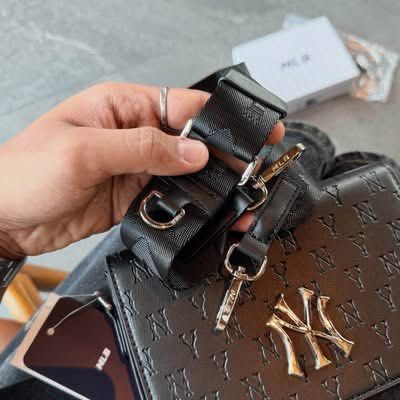 NY MLB Monogram Sling Bag (Category: Sling Bags) located in Manila. Submitted by hatline_co. (Listing ID 1466348157, Image 3). Description: NY MLB Mońoğram Sling bag Comes with Sling coin purse, MLB KOREA HARD BOX With hangtags Adjustable strap Inner pocket Inner 1zip SALE!!.