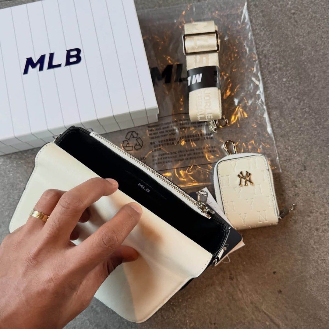 NY MLB Monogram Sling Bag (Category: Sling Bags) located in Manila. Submitted by hatline_co. (Listing ID 1466348514, Image 3). Description: NY MLB Mońoğram Sling bag Comes with Sling coin purse, MLB KOREA HARD BOX With hangtags Adjustable strap Inner pocket Inner 1zip SALE!!.