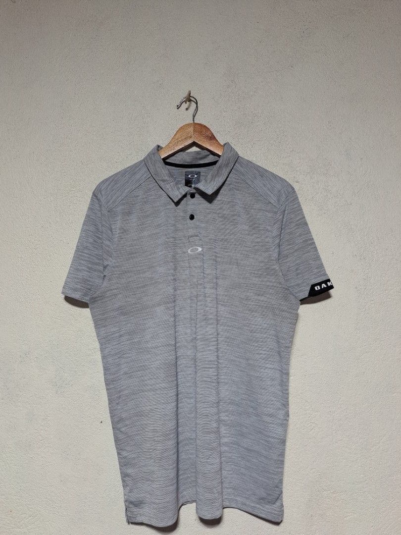 Oakley Gravity Golf Polo (Category: Tshirts & Polo Shirts ) located in Dumaguete. Submitted by jayarbajad49160 (Listing ID 1466448585, Image 2). Description: Oakley Gravity Golf Polo Authentic/Original - 1,800 add sf Excellent Condition Color rate:9.8/10 No issue Size Large Width:22 Length:29 Loc dumaguete city visayas 📩📩📩.