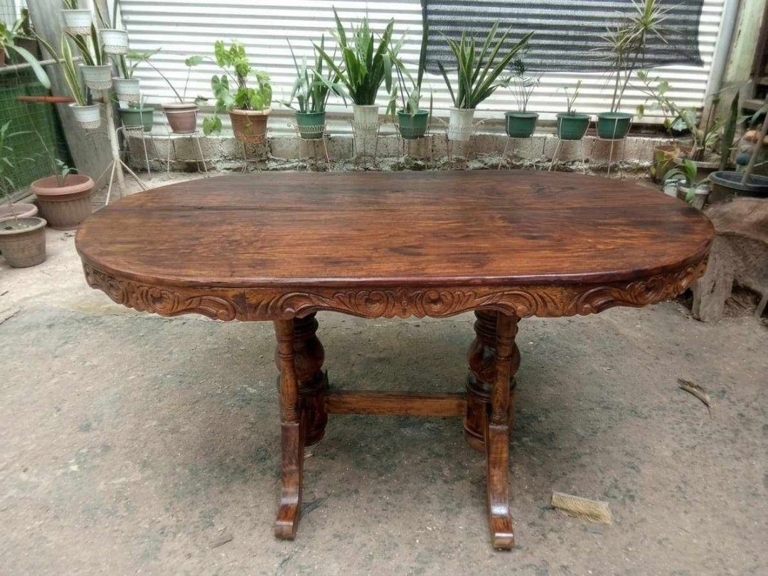 Old Dining Table (Category: Tables & Sets) located in Rizal. Submitted by mommykiee (Listing ID 1466400422, Image 1). Description: Old dining table Made of mix narra & acacia wood 2piece Narra top the rest acacia wood Size: L60 W36 H30inch Stripped & varnished.