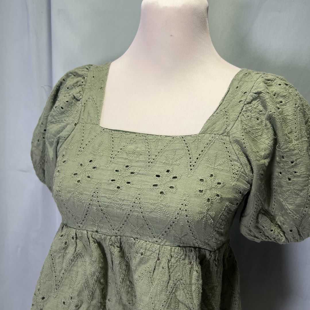olive green eyelet puff sleeve top (Category: Blouses) located in Malabon City. Submitted by minidressmonster (Listing ID 1466487423, Image 2). Description: olive green puff sleeve square neck top ruched back and garterized sa arm holes good as new, barely used small to med.