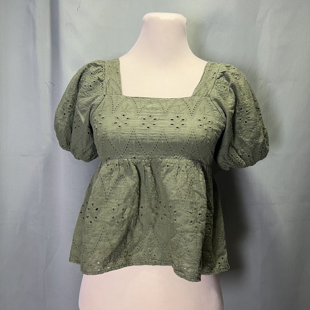 olive green eyelet puff sleeve top (Category: Blouses) located in Malabon City. Submitted by minidressmonster (Listing ID 1466487423, Image 1). Description: olive green puff sleeve square neck top ruched back and garterized sa arm holes good as new, barely used small to med.