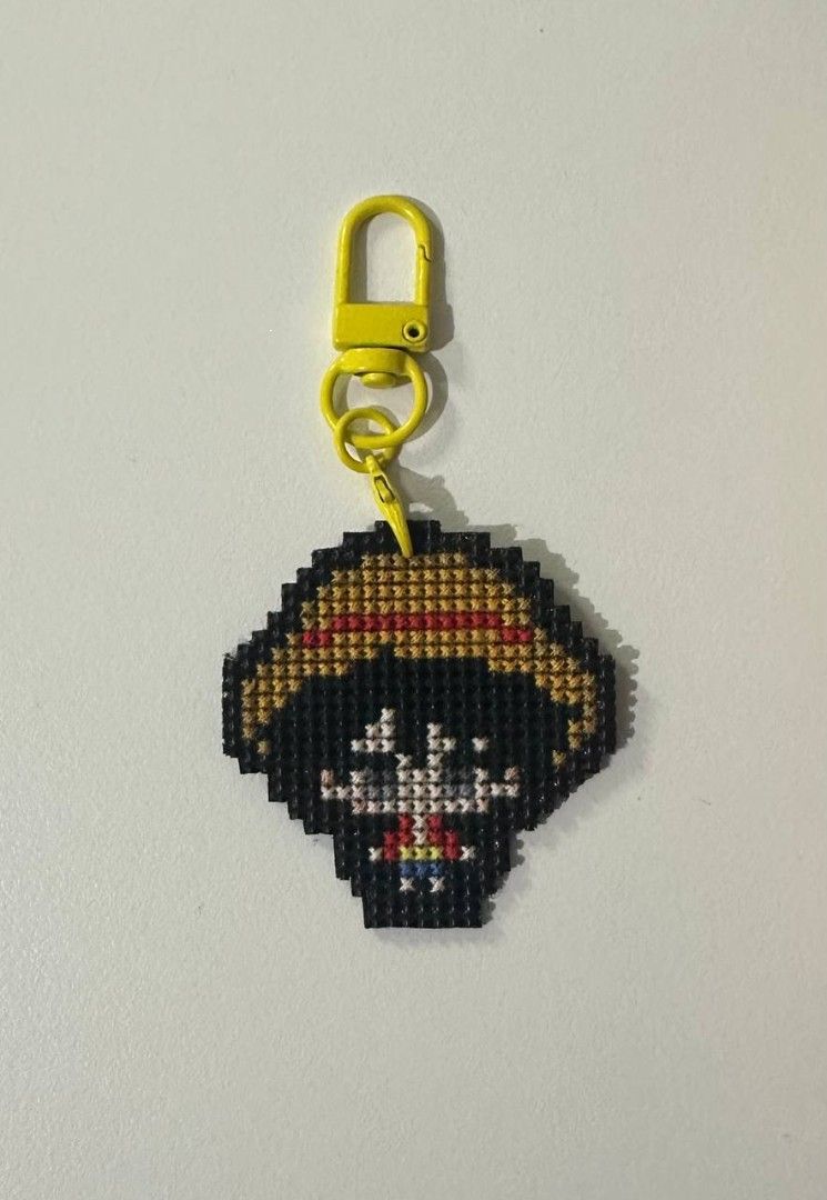 One Piece Luffy Cross Stitch Keychain (Category: Handmade Craft) located in Imus. Submitted by t0t3fairi3 (Listing ID 1466359889, Image 1). Description: Handmade Monkey D. Luffy cross stitch keychain with a sturdy plastic mesh backing and a bright yellow lobster clasp. Perfect for keys, bags, or as a gift for One Piece fans!.