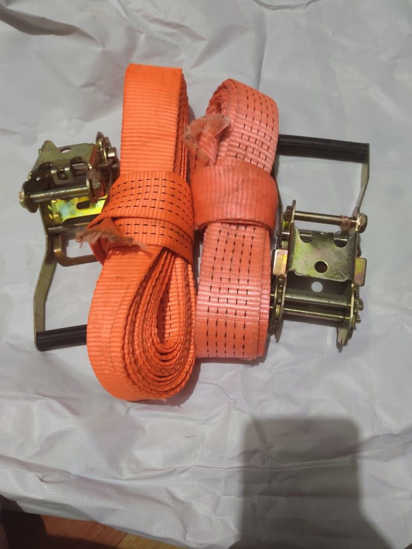 Orange Heavy Duty Ratchet Tie Down Straps Cargo Straps (Category: Construction Tools & Equipment) located in Muntinlupa City. Submitted by dhido (Listing ID 1466523205, Image 1). Description: - 2pcs heavy-duty orange ratchet tie-down straps - Metal ratchets with comfortable rubber grip handles - Strong, durable webbing material for heavy loads - Ideal for securing cargo, moving, and transport - Ready for pickup or delivery.