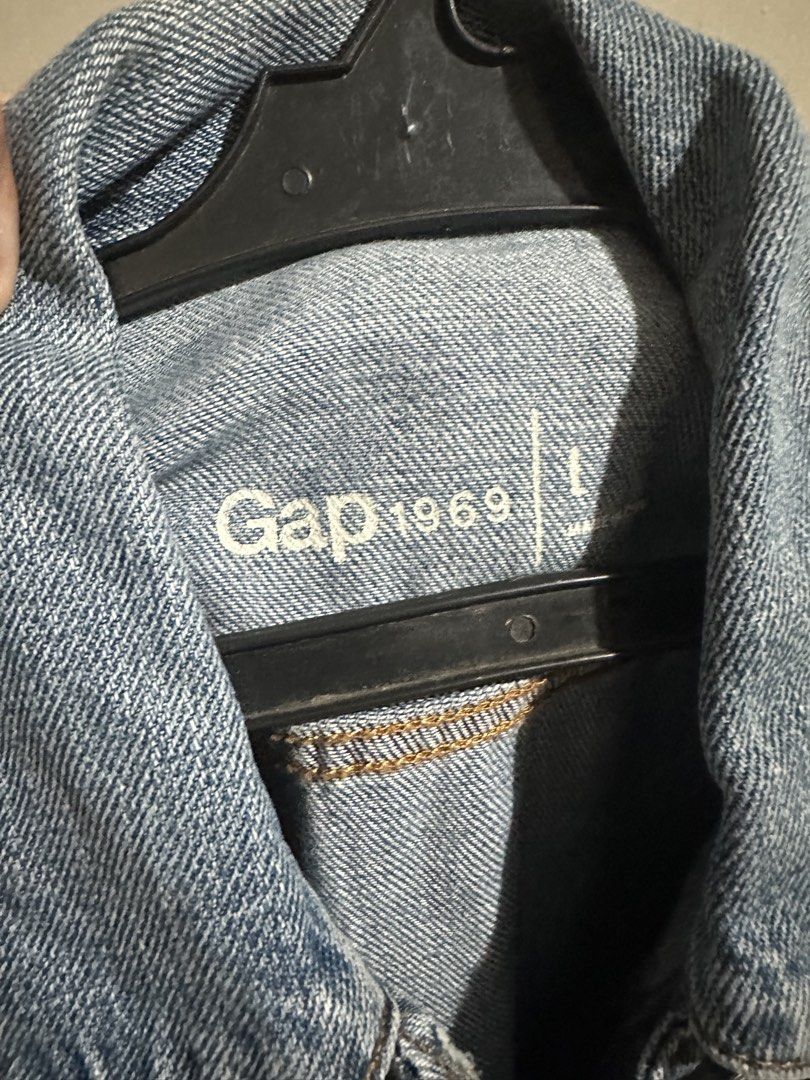 Original Gap Denim Jacket (Category: Coats, Jackets and Outerwear) located in Quezon City. Submitted by cecillebuendia (Listing ID 1466437786, Image 2). Description: - Brand/Style: Gap 1969 Classic Trucker Denim Jacket - Medium blue, size L (fits small to large frames depending on your preferred fit!) - Condition: Excellent, timeless wardrobe staple - RFS: Extra denim jacket, declutterring. Can send when worn. Price is negotiable :).
