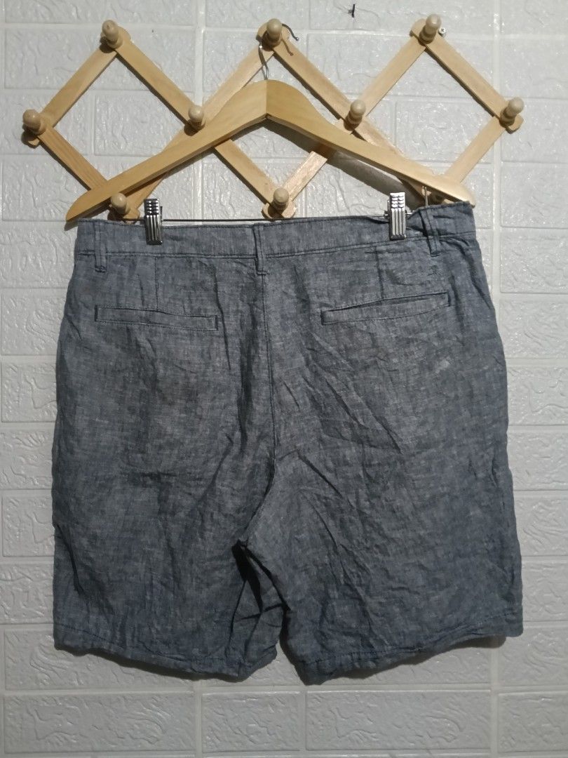 Original Penguin Blue Shorts Size 33 (Category: Shorts) located in Manila. Submitted by marvinenri31598 (Listing ID 1466353823, Image 2). Description: - Brand: Original Penguin - Color: Blue - Size: US 33 / EU 49 - Material: Lightweight cotton - Origin: Made in Vietnam - Features: Button closure, zip fly, front pockets, rear welt pockets, and embroidered penguin logo - Style: Comfortable casual wear for warm weather.