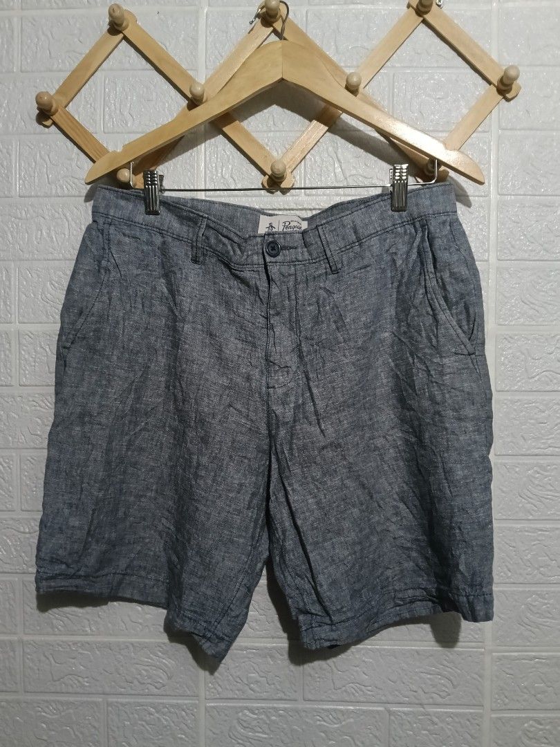 Original Penguin Blue Shorts Size 33 (Category: Shorts) located in Manila. Submitted by marvinenri31598 (Listing ID 1466353823, Image 1). Description: - Brand: Original Penguin - Color: Blue - Size: US 33 / EU 49 - Material: Lightweight cotton - Origin: Made in Vietnam - Features: Button closure, zip fly, front pockets, rear welt pockets, and embroidered penguin logo - Style: Comfortable casual wear for warm weather.