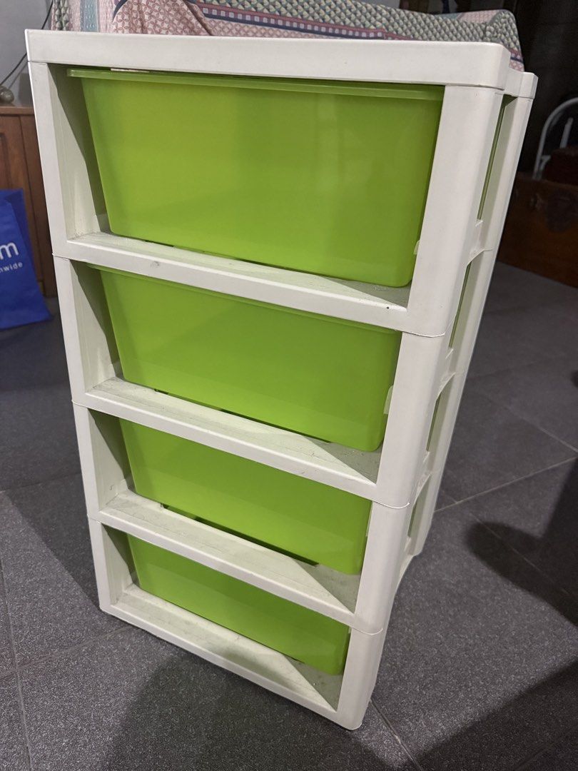 Orocan Prima 4-Tier Plastic Storage Drawer Green White (Category: Shelves, Cabinets & Racks) located in Makati City. Submitted by lucy_dec (Listing ID 1466351927, Image 3). Description: - Brand/Model: Orocan Prima 4-Tier Cabinet - Color: Bright green translucent drawers with a white frame - Storage: 4 roomy drawers for clothes, toys, or daily clutter - Material: Sturdy, durable plastic build - Condition: Clean, well-maintained, and ready to use R