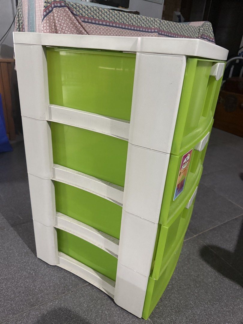Orocan Prima 4-Tier Plastic Storage Drawer Green White (Category: Shelves, Cabinets & Racks) located in Makati City. Submitted by lucy_dec (Listing ID 1466351927, Image 2). Description: - Brand/Model: Orocan Prima 4-Tier Cabinet - Color: Bright green translucent drawers with a white frame - Storage: 4 roomy drawers for clothes, toys, or daily clutter - Material: Sturdy, durable plastic build - Condition: Clean, well-maintained, and ready to use R