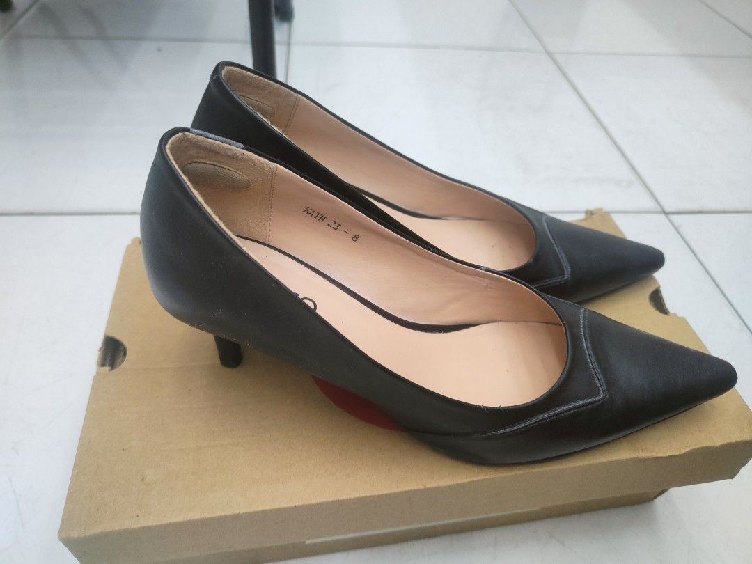 Otto Black Heels Size 8 (Category: Heels) located in Manila. Submitted by cabsclosetco (Listing ID 1466456285, Image 3). Description: Preloved 💗 - Brand: Otto - Original price: 1,200+ - Style: Pointed toe kitten heels with slip-on fit - Color: Classic black with nude branded inner sole - Size: US 8 (stamped on inner tag) - Inclusion: Original shoe box included - Condition: Excellent, ready for work or casual wear.
