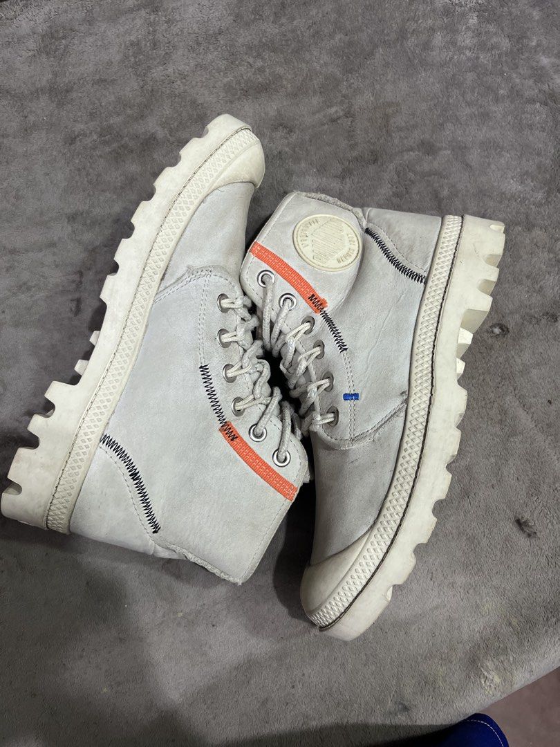 Palladium Pampa Underlayer High Top Trainers | Size 38 (Category: Boots) located in General Trias. Submitted by zrchustle.604 (Listing ID 1466443545, Image 3). Description: Palladium Pampa Underlayer High Top Trainers, featuring a distinct sand/beige colorway accented by bright orange detailing down the collar, exposed decorative stitching, and a side zipper closure. The Pampa Underlayer model updates Palladium's traditional canvas utility boot p