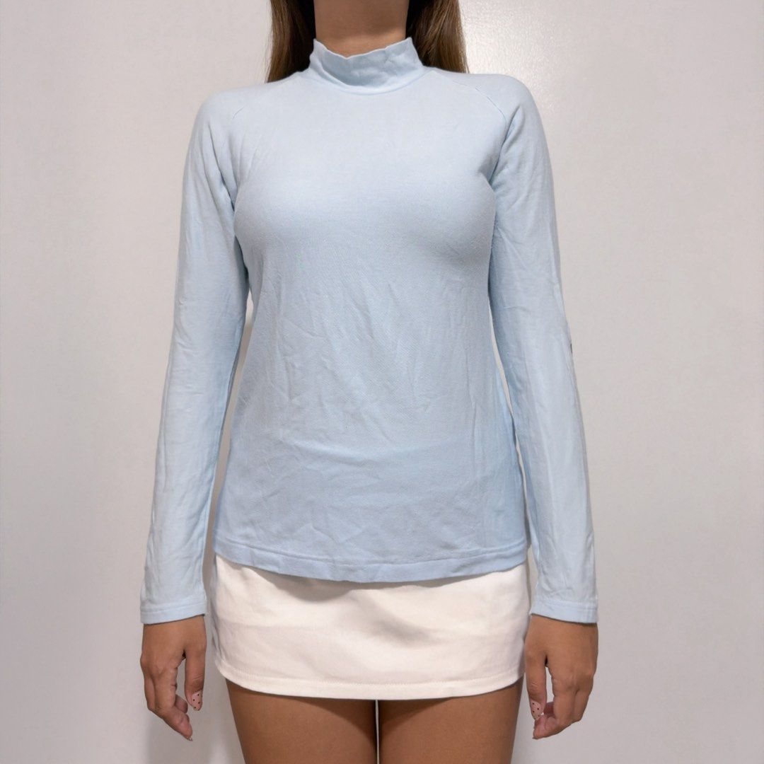 pastel blue turtle neck top (Category: Longsleeves) located in Cebu City. Submitted by cuteoncue (Listing ID 1466535897, Image 3). Description: small-med large on tag but runs small. last photo shows the detail on the sides of both sleeves..