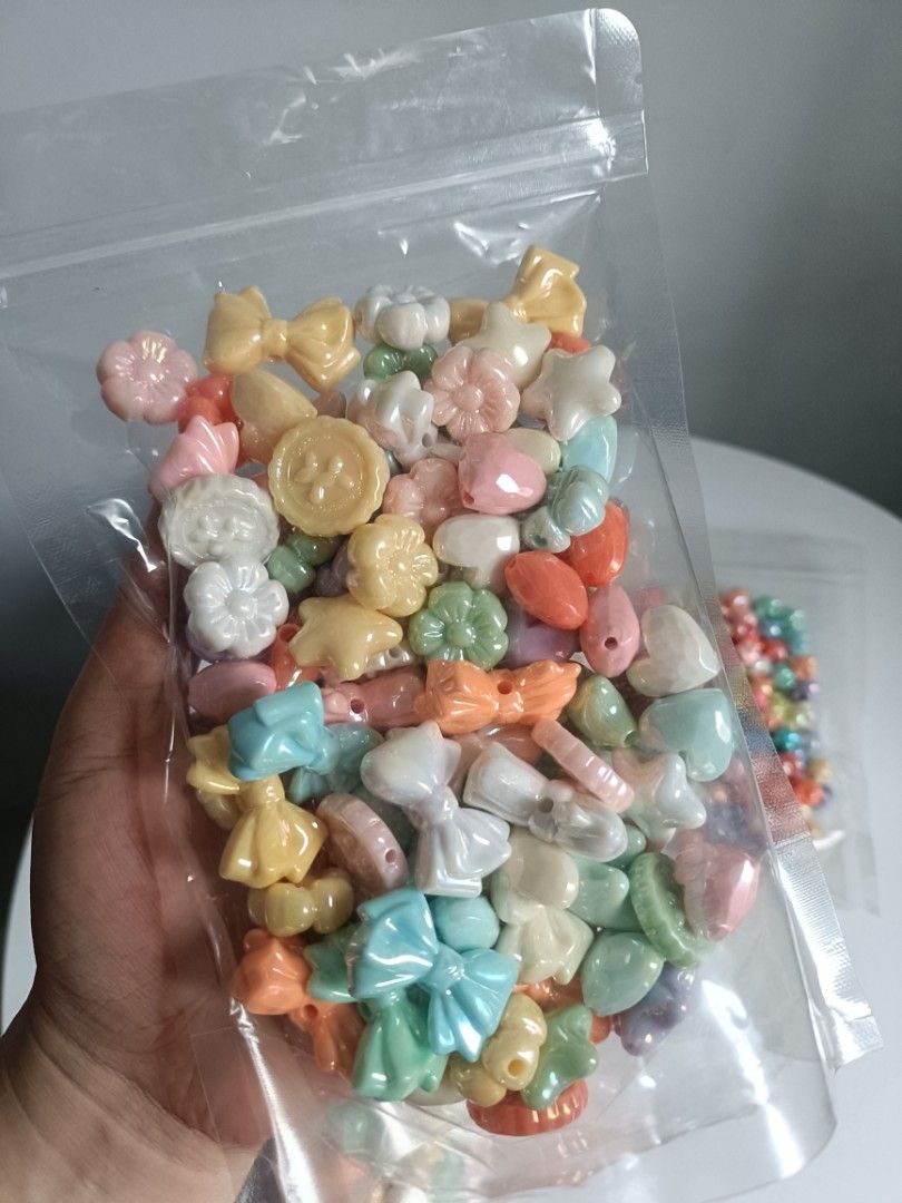 Pastel Craft Beads Assorted Shapes and Sizes 4 Packs (Category: Craft Supplies & Tools) located in Tanza. Submitted by misumei (Listing ID 1466356832, Image 3). Description: INLCUSION: ✨ Star (big hole) - approx. 155g ✨ Irregular Shaped - approx. 390g ✨ Spiral Cookie Star - approx. 230g ✨ Chucky Mixed - approx - 250g.