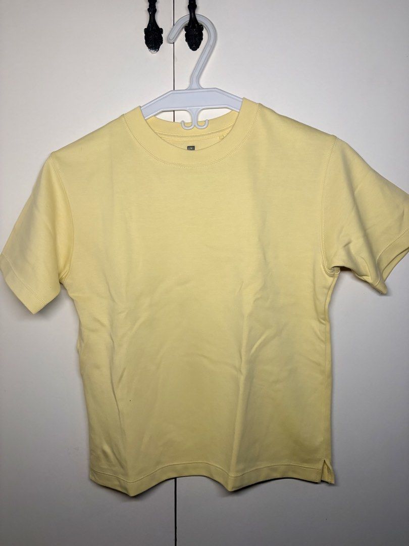 Pastel Yellow Crew Neck Tee (Category: Shirts) located in Paranaque City. Submitted by honeykkkk (Listing ID 1466489729, Image 1). Description: • Details: Classic round neck short-sleeve shirt in soft pastel yellow with thick collar ribbing and small side hem slits. • Condition: Worn once only (Like new condition). • Original Retail Price: PHP 290 – PHP 490 • Size: Tagged 130 (Fits XXS to S / Kids 7-8Y)..