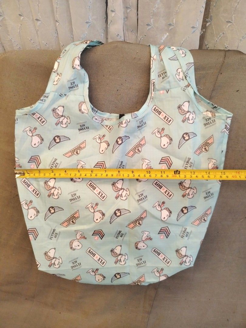Peanuts Snoopy Flying Ace Foldable Reusable Tote Bag (Category: Tote Bags) located in San Fernando. Submitted by jpmarketplace2023 (Listing ID 1466431360, Image 3). Description: 💚 All items are authentic from Japan. 💛 MOP: GCash (❌️ GCash Protect) 🩵 MOD: LBC only (❌️ S. Checkout, COD, COP) 💙 Meet-up: Vista Mall, San Fernando, Pampanga 💜 All items are on-hand. 🧡 First to pay gets the item first. ❤️ Breakable items are packed with care and ca