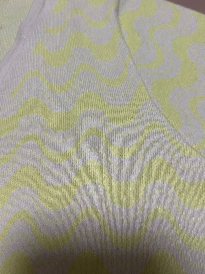 Penshoppe Tie-Front Knit Top (Category: Longsleeves) located in Manila. Submitted by malggg (Listing ID 1466510241, Image 3). Description: (Decluttering again!) Got this in 2024 on sale! Loved the pattern and the fit but I only got to wear it once! Now I feel like I either grew or the top shrunk (hahaha) because when I try to fit it my movements feel restricted. Wore mine with a little sando inside but you can style it without. (Color may vary du