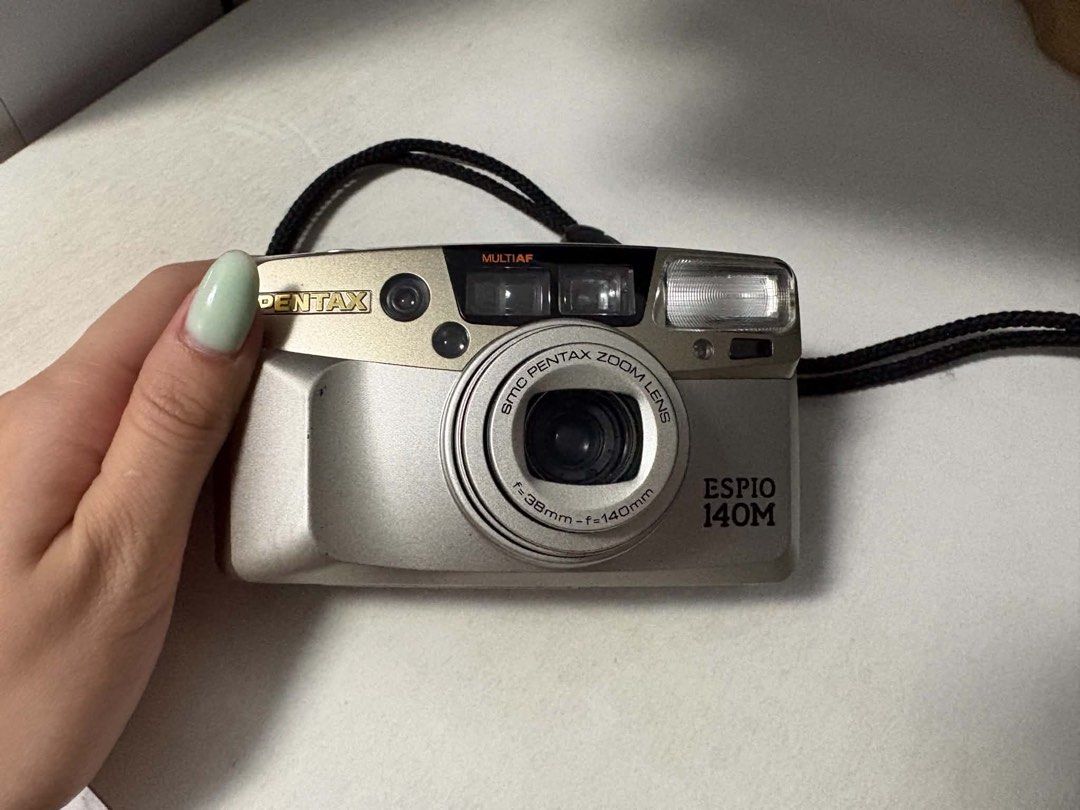 Pentax Espio 140M (Category: Cameras) located in Baliuag. Submitted by from.linea (Listing ID 1466504751, Image 1). Description: Pentax Espio 140M - working condition - good body condition - clear viewfinder issue: - on and off button is loose (doesn’t affect the usage) - display (only the film counter is showing) - lens might need cleaning RFS: need funds Price is negotiable Location: Baliwag, Bulacan Shipping: J&T and SPX (buyer’s expense).