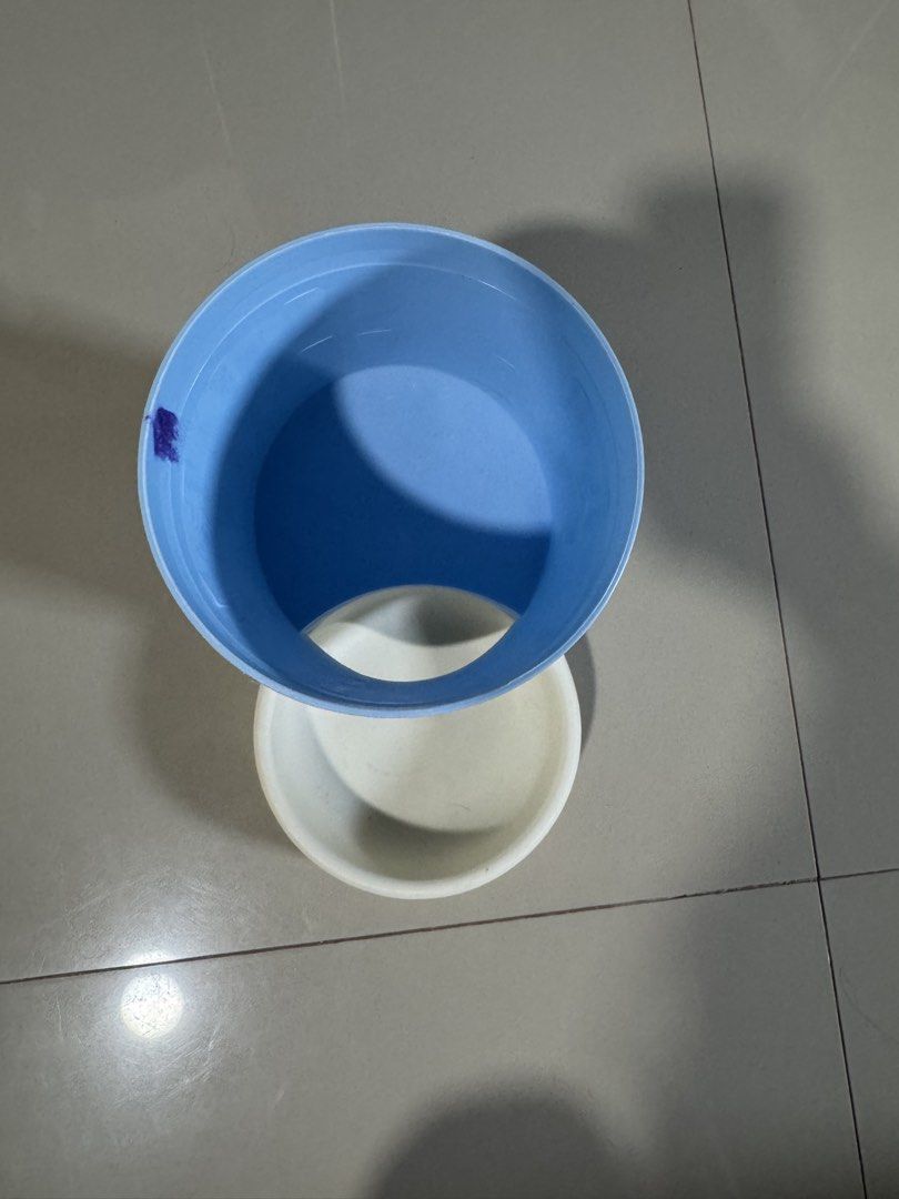 pet feeder (Category: Pet Food) located in Cagayan de Oro. Submitted by serenexsienna (Listing ID 1466527594, Image 3). Description: ✅Blue and White Gravity Pet Feeder ✅Color: Light blue and white ✅Type: Gravity pet feeder for cats and small dogs ✅Design: Large top storage cylinder with a wide feeding bowl ✅Maintenance: Easy to take apart and clean between refills ✅Condition: never been used ✅meet-up ✅delivery.