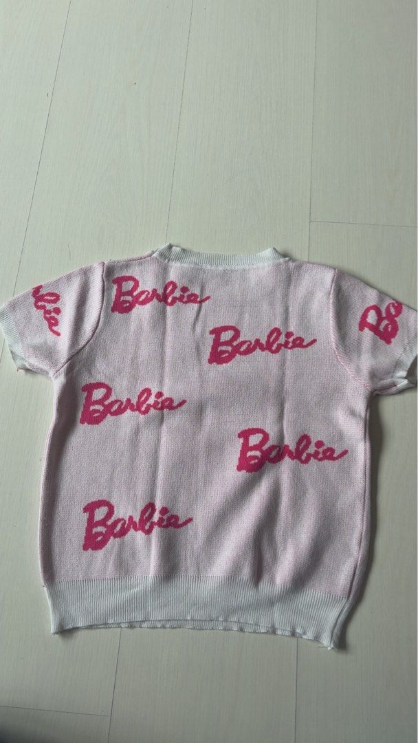 Pink Barbie Shirt (Category: Blouses) located in Mandaluyong City. Submitted by 2goodfinds (Listing ID 1466466193, Image 2). Description: From Thailand In good Condition No stains Stretchable ( Can fit Small ) .