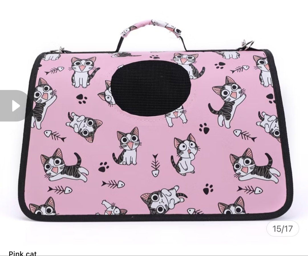 Pink Cartoon Cat Pattern Pet Carrier Bag (Category: Homes & Other Pet Accessories) located in Manila. Submitted by epiceagle-2713 (Listing ID 1466408177, Image 1). Description: - Adorable pink design featuring cute cartoon cats and fish bones - Breathable black mesh window in the center for good ventilation - Secure zippered structure to keep small pets safe during travel - Padded top handle for comfortable and easy carrying - Ideal for small pet