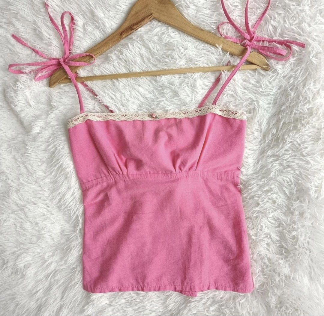 pink coquette self tie top (Category: Sleeveless) located in Caloocan City. Submitted by daintyyellow (Listing ID 1466544262, Image 1). Description: xs-s never used full length adjustable.