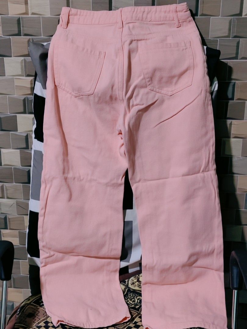 Pink denim straight pants (Category: Jeans) located in Pateros City. Submitted by soshifem (Listing ID 1466543828, Image 2). Description: size 25.