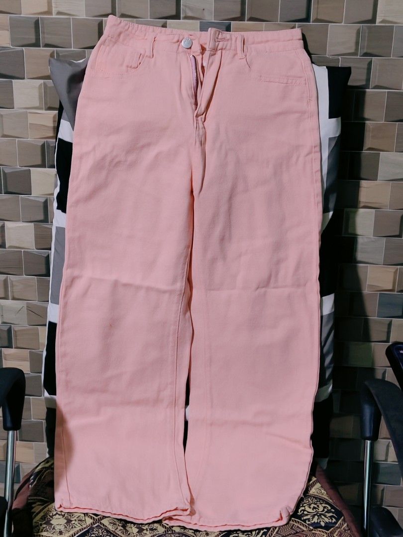 Pink denim straight pants (Category: Jeans) located in Pateros City. Submitted by soshifem (Listing ID 1466543828, Image 1). Description: size 25.