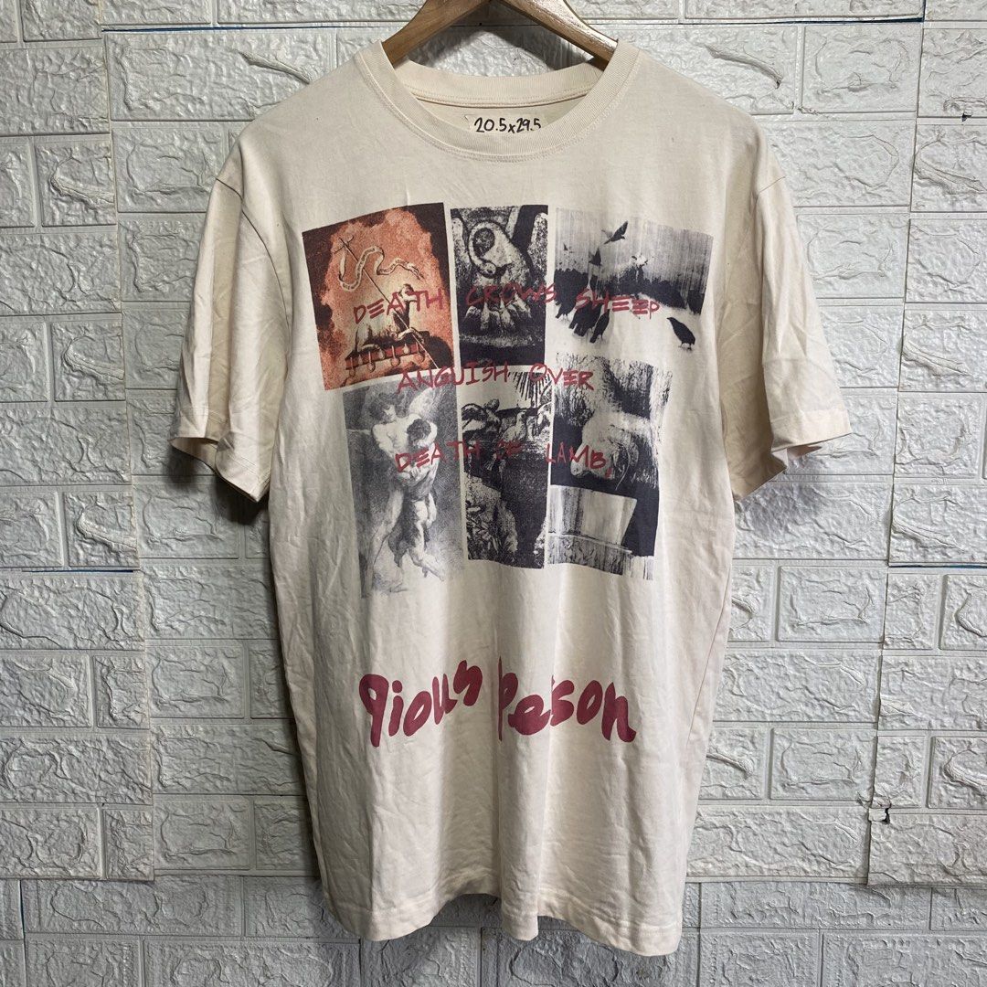 Pious Person Graphic Tee Beige Size M (Category: Tshirts & Polo Shirts ) located in Naga. Submitted by thesource4400 (Listing ID 1466477398, Image 1). Description: - Color: Cream - Style: Short sleeve graphic tee with front and back prints - Front Design: Multi-panel dark art prints with 'Pious Person' in red text - Back Design: Inspirational text layout - Size: Tagged Medium - Measurements: 20.5 inches chest x 29.5 inches length - Material: 100%