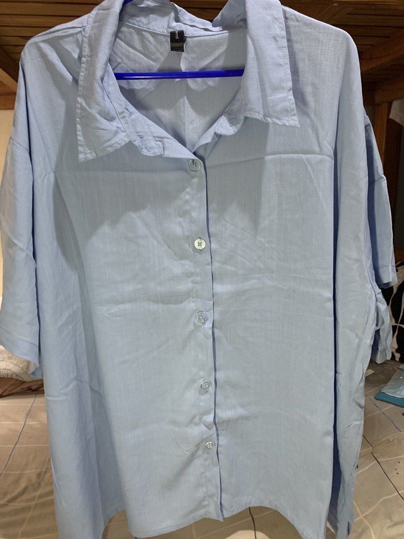 Plus Size Blouse Polo (Powder blue) - Unused (Category: Blouses) located in Manila. Submitted by tmlo.25 (Listing ID 1466369737, Image 3). Description: Plus Size Blouse Polo - Unused - Powder Blue - Brand new - Cozy & Komfi Best fit (Bust): 55”-58” Bustline (Flat lay): 60” Armhole: 24” Length: 28” Material: Soft Linen RFS: bought the wrong size.