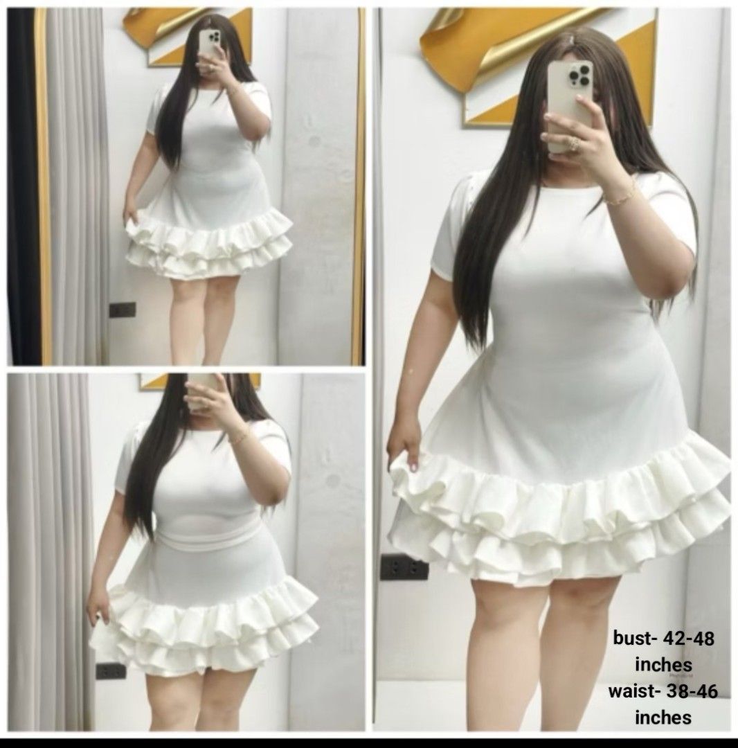Plus Size Dress (Category: Dresses) located in Manila. Submitted by jnsrn4726 (Listing ID 1466361405, Image 1). Description: - Color: White - Style: Short sleeve mini dress with fitted top - Feature: Double-layered ruffle hem for volume and movement - Material: Soft and stretchy fabric for all-day comfort.