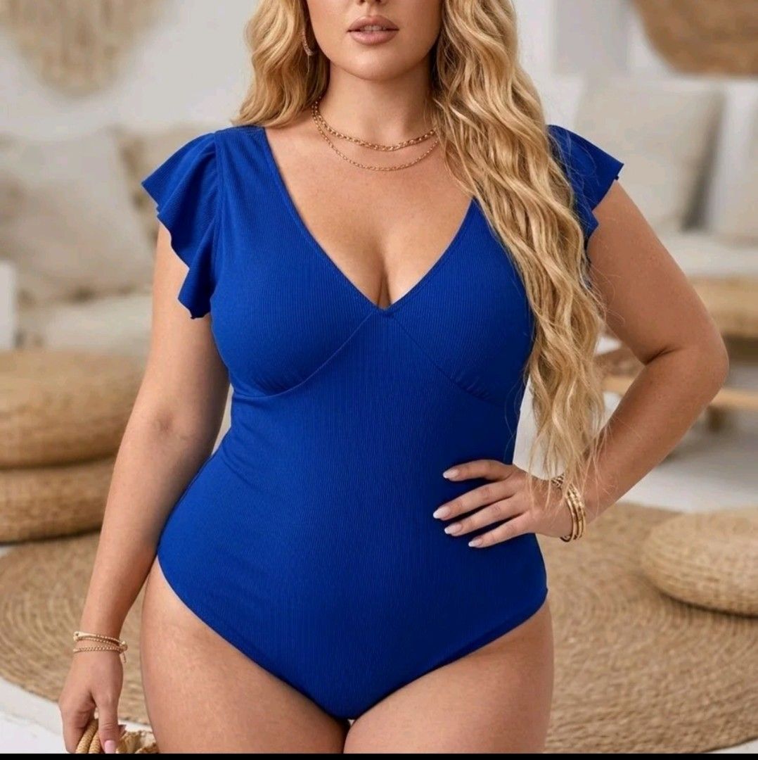 Plus size Swim suits (Category: Bikinis & Swimsuits) located in Manila. Submitted by isurinajen04726 (Listing ID 1466361778, Image 3). Description: - Eye-catching bright pink with a bold floral pattern - Long sleeves and scoop neckline for great coverage - Trendy crossover strap back and side cutouts - Flattering high-cut leg opening - Comfortable, stretchy fabric that's easy to slip on and off.